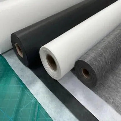 Interlining PV Plain Fabric – "Close-up of plain interlining PV fabric, used to provide structure and stability in garment construction."
