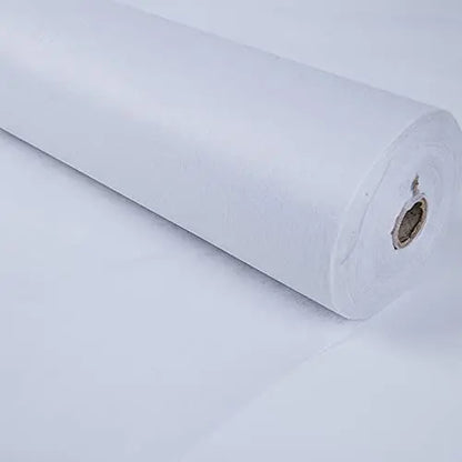 Roll of non-woven embroidery paper, perfect for large embroidery projects and stabilizing fabric."